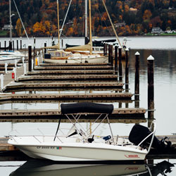 Boat Dock a regular boat and a couple sail boats